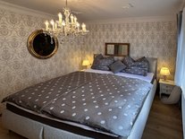 suite-romantik-wohnzimmer-mit-essbereich
